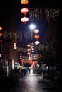 Chinese new year red lanterns in Chinatown. Decorations on the street. Milan, Italy - December, 12, 2019 Royalty Free Stock Photo