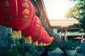 Chinese New Year Red Lanterns Hanging Against Chinatown Royalty Free Stock Photo