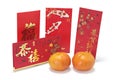 Chinese New Year Red Packets and Mandarins Royalty Free Stock Photo