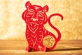 a Chinese New Year of tiger 2022 mascot paper cut on a wood table in the morning the Chinese means fortune no logo no trademark Royalty Free Stock Photo