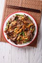 Chinese noodles with beef, muer and vegetables. vertical top vie Royalty Free Stock Photo