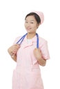 Portrait of a beautiful Asian nurse with a stethoscope isolated on white background Royalty Free Stock Photo