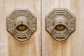 Chinese old bronze lock in wooden door.