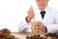 Chinese old Chinese doctors are using medicine mortar to pound medicine Royalty Free Stock Photo