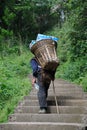 Chinese old man carry bottled water