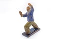 Chinese Old Man Dancing Tai Chi Statue on White Background Royalty Free Stock Photo