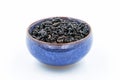 Chinese Oolong Dark Red tea Black Tie Guan Yin in a blue ceramic bowl Royalty Free Stock Photo