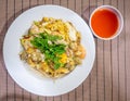 Chinese oyster omelette with chilli sauce Royalty Free Stock Photo