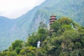 Chinese pagoda and Buddha statue in mountain in Taroko National Park, Taiwan Royalty Free Stock Photo