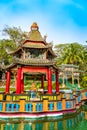 Chinese Pagoda and Pavilion by the Lake at Haw Par Villa Theme Park, Singapore. Royalty Free Stock Photo