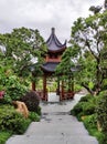 Chinese pagoda pavilion among the trees in Asian style park Royalty Free Stock Photo