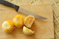 Chinese pastry stuffed sweet mashed bean and salty egg yolk on wooden chop block