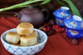 Chinese Pastry with Tea set on Background Royalty Free Stock Photo