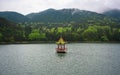 Pavilion in middle of Lulin lake in Lushan national park Jiangxi China