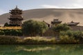 Chinese pavilion near Crescent Moon Lake in the desert Royalty Free Stock Photo