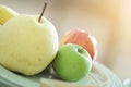 Chinese pear, green and red apples onglass plate Royalty Free Stock Photo