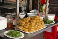 Chinese people cooking Fried Tofu with vegetables and sweet sauce for severe to customer thai people at restaurant in Chaozhou