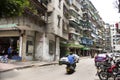 Chinese people drive and ride and bike on the road and traveler visit in old town at Shantou or Swatow city in Guangdong, China