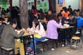 Chinese people enjoy the food in a restaurant in Xian, China Royalty Free Stock Photo