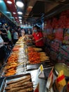 Chinese enjoying snacks at indoor food stalls in wuhan city