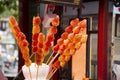 Dessert fruit coating sugar in local shop at night street market at Shantou or Swatow in Chaozhou, China