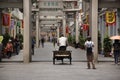 Chinese people and foreigner travelers travel and walk visit on Paifang Street in old town and ancient city center of Chaozhou Royalty Free Stock Photo