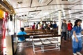 Chinese people and foreigners travelers walking up from Ferry Boat go to Kowloon pier station in Hong Kong Royalty Free Stock Photo