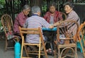 Chinese people are playing domino outdoor in park of Chengdu