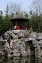 Chinese people under a gazebo at Guyi Gardens Royalty Free Stock Photo