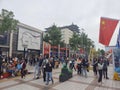 Chinese people walking at the famous Wangfujing shopping street in Beijing.