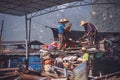 Chinese people working on metal recycling yard