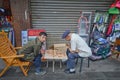 Chinese playing a game on the street