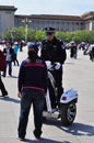 Chinese Policeman on Segway answering the public