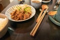 Chinese pork dish on table with side dishes Royalty Free Stock Photo