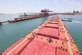 Into the Chinese port of Qingdao ore carriers