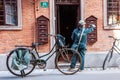 Chinese postwoman delivers mail by bicycle