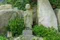 Chinese priest stone sculpture in the garden of Haedong Yonggungsa Temple