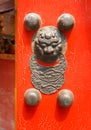 Chinese red door with a dragon head Royalty Free Stock Photo
