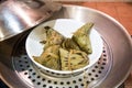 Chinese rice dumplings or zongzi in wok for steaming Royalty Free Stock Photo