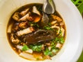 Chinese roll noodle soup or Kuay jub, one of Thai street food that contained noodles roll, pork livers, pork blood, pork kidney, b Royalty Free Stock Photo