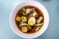Chinese roll noodles soup with pork and egg Royalty Free Stock Photo