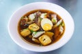 Chinese roll noodles soup with pork and egg Royalty Free Stock Photo