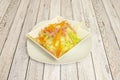 Chinese salad with ham, grated carrot, iceberg lettuce and transparent strips Royalty Free Stock Photo