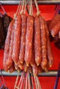 Traditional Chinese dried sausages - lap cheong, for sale at a Lunar New Year bazaar