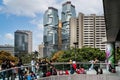 Chinese school children gathering on elevated walkway in front of the Lippo Centre in Hong Kong Royalty Free Stock Photo