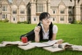 Chinese schoolgirl learns at park Royalty Free Stock Photo