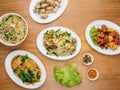 chinese seafood table Beancurd Kailan in dish with chili sauce, and king\'s salad leaf top vie