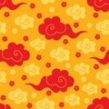 Chinese seamless pattern of with gold and red clouds on a Golden background. Festive traditional Asian ornament of clouds, waves Royalty Free Stock Photo