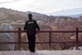 A Chinese Security Guard Is Viewing Landscape.