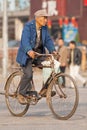 Chinese senior on a rusty bike, Beijing, China